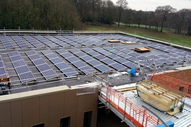 The solar farm on the roof containing over 200 solar panels.